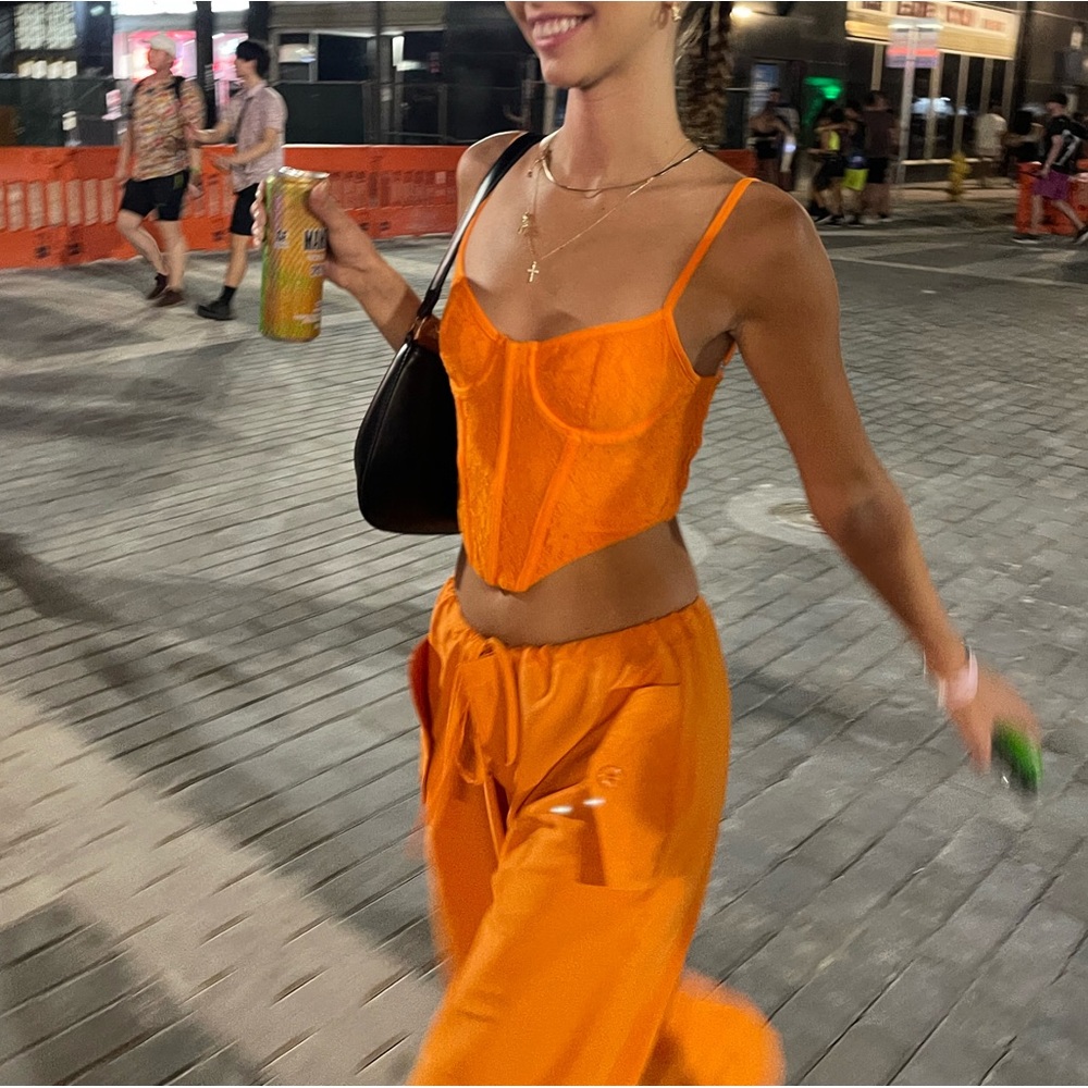 Orange parachute pants size xs